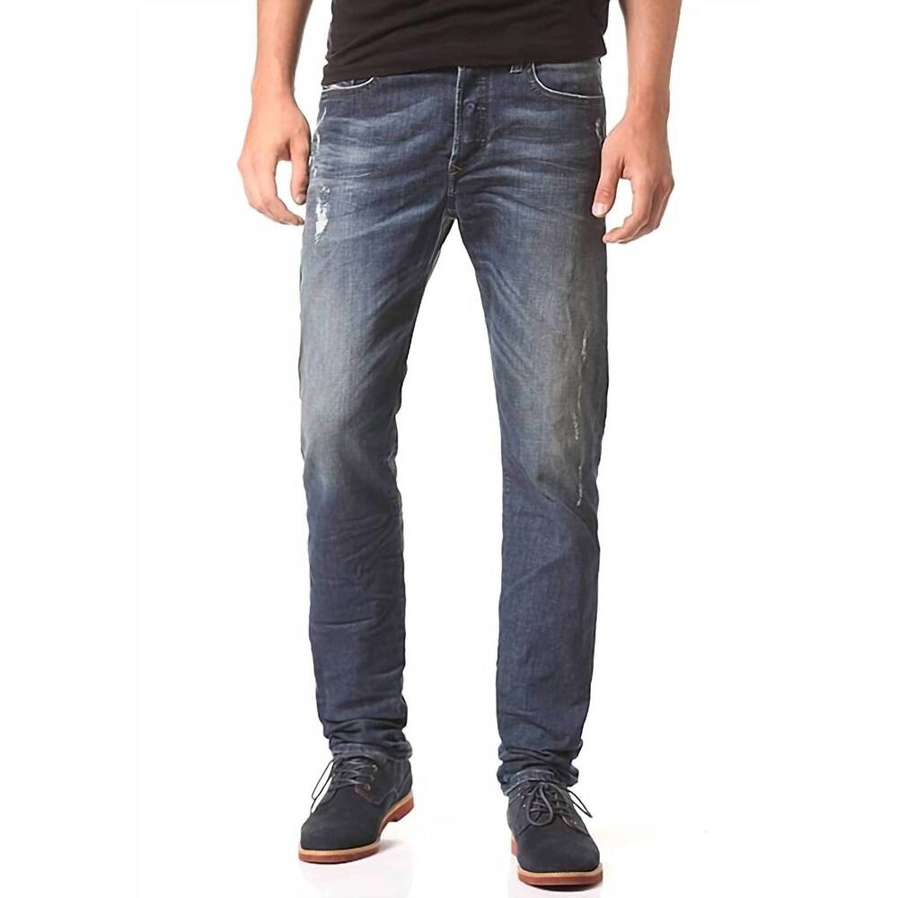 NEW DIESEL BLACK GOLD men's buster regular tapered leg jean in dark indigo